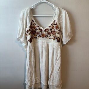 Elegant White Dress with Floral Embroidery